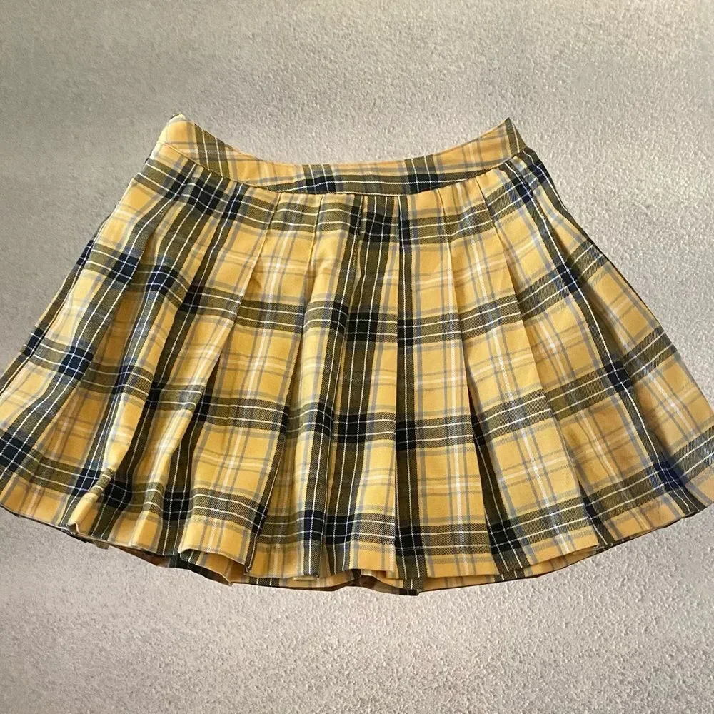 Bundle of pleaded plaid mini skirts